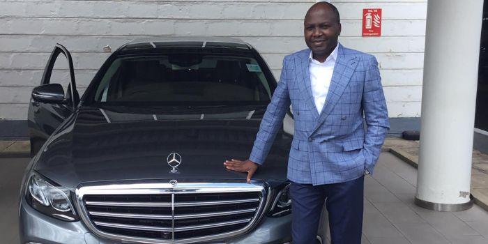 Prominent city lawyer Donald Kipkorir poses with one of is luxury cars.