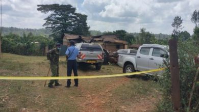 Police officer at the scene of the arson in Kandara Muranga County on Sunday April 10 2022.