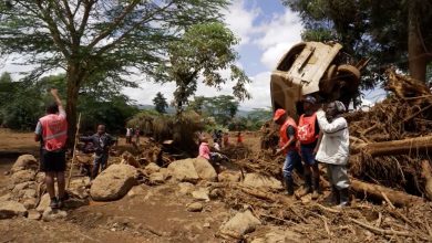 overturned vehicles, uprooted trees and homes which had been swept away in mass flooding. Larry Madowo/CNN
